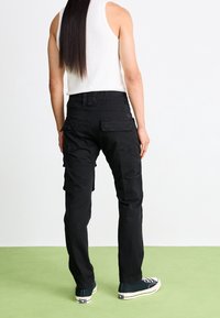 Alpha Industries Kapsáče - black