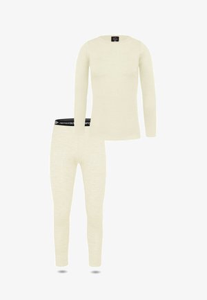 Langärmliges Thermoshirt in Cremefarbe und passende Leggings mit schwarzem elastischem Bund und weißem Markentext.