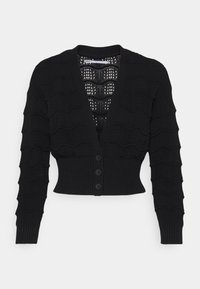 Svart kort kardigan med V-ringning, texturerad vågmönster, långa ärmar och fyra knappstängningar. Ribbad nederkant och manschetter.