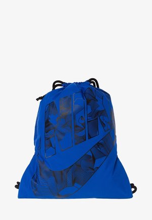 Sac à cordon bleu Nike avec motif abstrait noir et grand logo Nike stylisé sur le devant.
