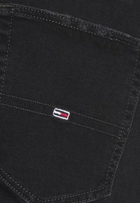 Tommy Jeans Skinny-Farkut - black denim