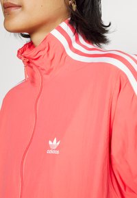 adidas Originals TRACK - Letná bunda - semi turbo