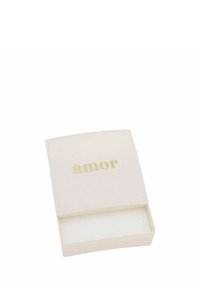 Caja rosa clara con el texto dorado "amor" en la tapa; cuenta con un acabado suave y una parte superior abierta, con un interior blanco.