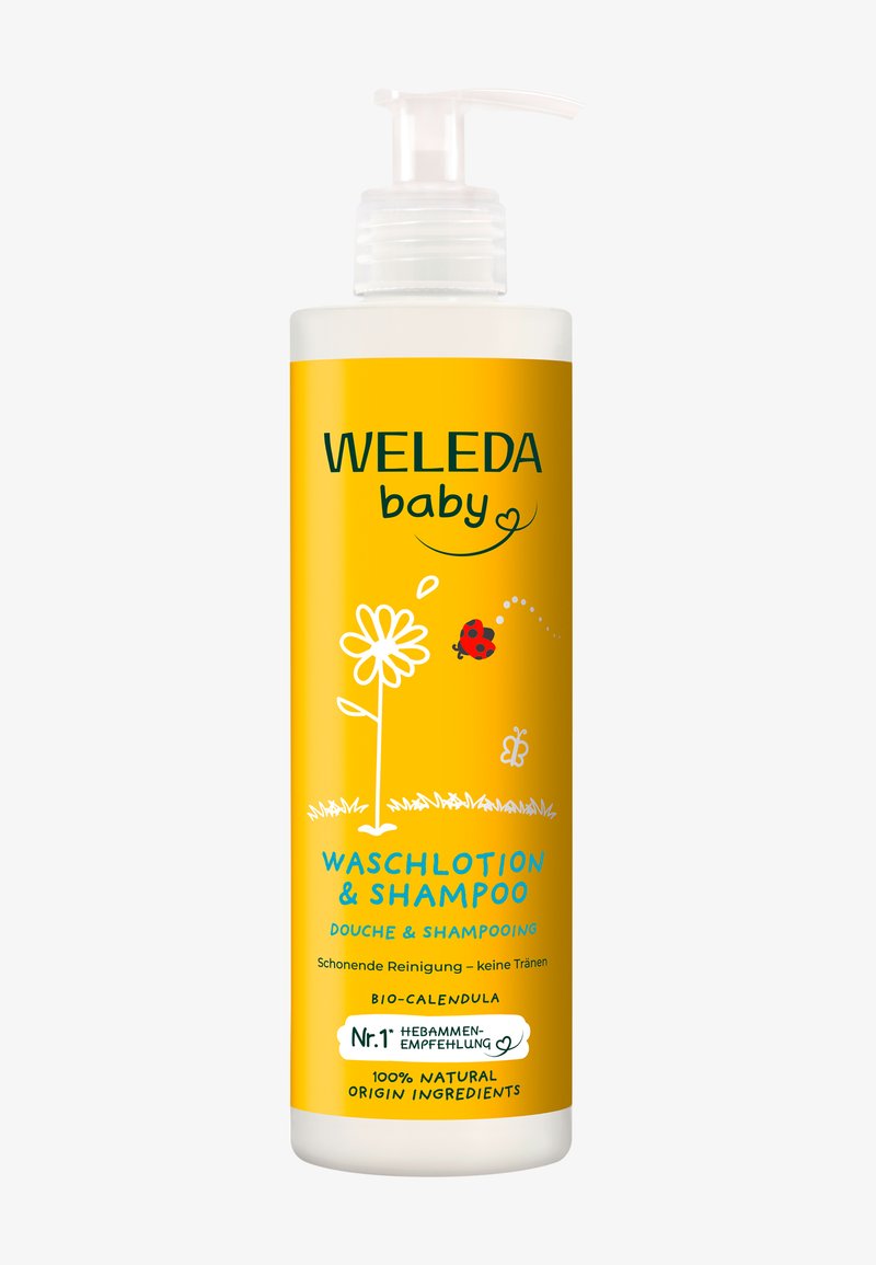 Weleda Baby waslotion en shampoo in een gele fles met een pompdispenser. Heeft bloemen- en lieveheersbeestillustraties; tekst in groen en blauw.