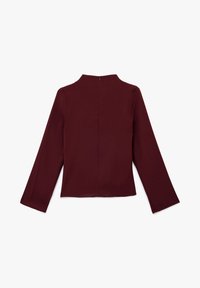Bordeaux lange mouwen top met een hoge hals, voorzien van een ritssluiting op de rug. Soepele stof met een getailleerde pasvorm en minimalistisch ontwerp.