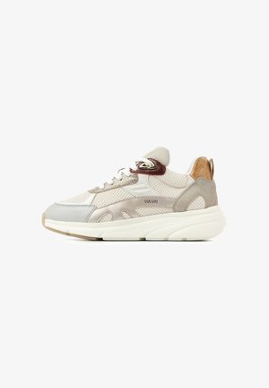 Low-top beige and gray sneaker with white laces, thick sole, brown leather accent near the ankle, and brand name "VIA VAI" on the side.