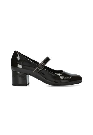 Chaussure Mary Jane en cuir verni noir avec petit talon bloc et bride réglable avec boucle sur fond blanc.