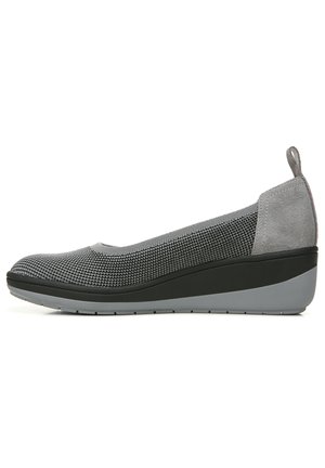Gray slip-on shoe featuring a mesh upper and smooth suede accents, with a rounded toe and wedge sole design for added height and comfort.