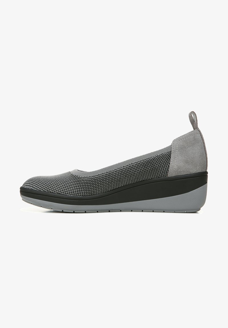 Gray slip-on shoe featuring a mesh upper and smooth suede accents, with a rounded toe and wedge sole design for added height and comfort.