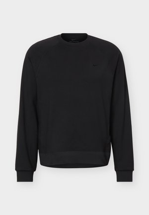 Hanorac negru cu mâneci lungi, gât rotund, cu mansete și tiv striate, având un mic logo Nike subtil pe pieptul stâng.