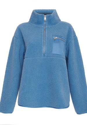 Sudadera de forro polar azul con cuello alto, cierre de cuarto de cremallera y un bolsillo en el pecho con cremallera. Tejido suave y texturizado con un corte relajado.