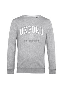 Felpa grigia con collo a barchetta, con "OXFORD" in grassetto bianco e "UNIVERSITY" sottostante in un font più piccolo. Vestibilità classica.