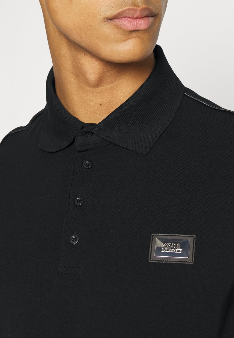 Herren T-Shirts basic | KARL LAGERFELD Poloshirt black/schwarz - IE90248 Herren T-Shirts basic | KARL LAGERFELD Poloshirt black/schwarz - IE90248