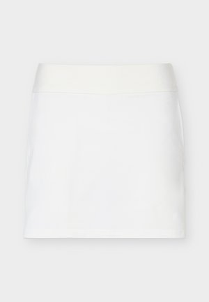 Fustă albă evazată în formă de A, cu o talie elastică lată, textura netedă și fără modele sau ornamente vizibile.