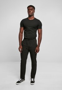 Urban Classics Trainingsbroek - black