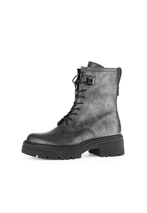 Black leather ankle boot with textured finish, laces up front, side zipper, and chunky sole. Features metal accents for added detail.