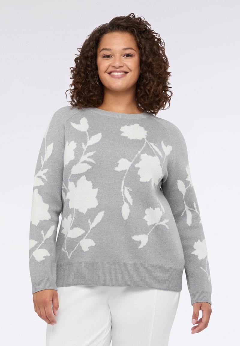 Šedý pletený svetr s bílým květinovým vzorem, kulatým výstřihem, dlouhými rukávy a vroubkovaným lemem. Měkká textura a uvolněný střih.