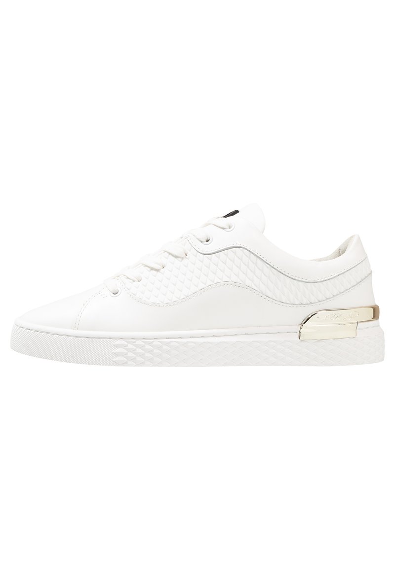 White leather sneakers with textured accents, a smooth finish, and a decorative silver hardware detail on the side.
