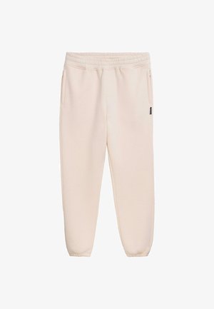 Pantalons de survêtement beige clair avec une taille élastique, poches latérales etpoignets ajustés. Fabriqués à partir d'un matériau doux avec une texture lisse.