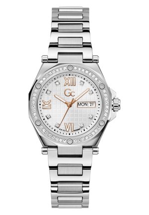 Silver stainless steel watch with an octagonal case, a textured white dial, rose gold accents, a date display, and crystal embellishments.