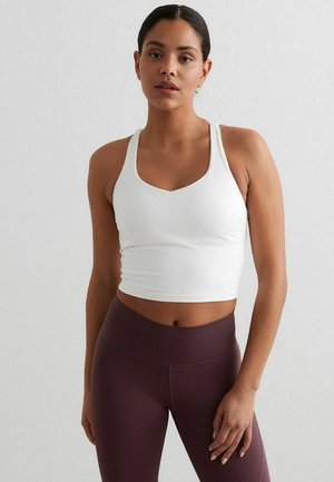 SCULPTING STRAPPY BRALETTE - Brassières de sport à maintien léger - white