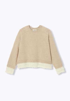 Pull beige au design court, orné d'une bordure en dentelle crème texturée à l'ourlet et aux manches. Matière tricotée, encolure ronde et manches longues.