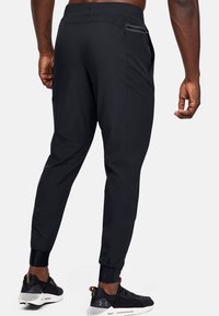 Under Armour UNSTOPPABLE JOGGERS - Tracksuit bottoms - black