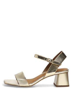 Sandalia abierta dorada con tacón bajo de bloque, correa en el tobillo con hebilla y plantilla acolchada.