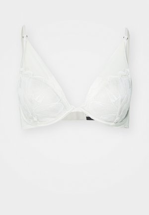 Balts mežģīņu apmalēts trīsstūra krūšturis ar gludu auduma kārtu un maigiem līkumiem, ar ziedu izšuvumu krūšu daļā. Regulējamās siksnas.