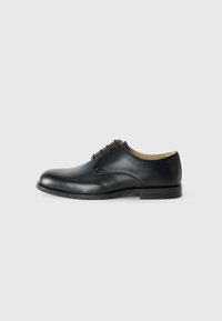 - Eleganckie buty