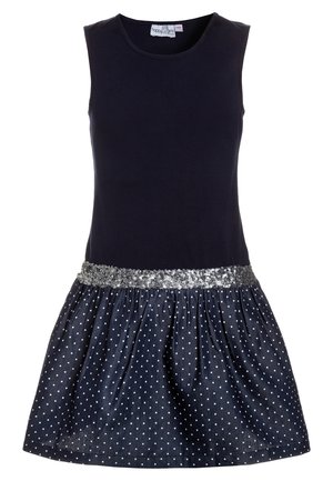 Laivastonsininen mekko, jossa on hihaton yläosa ja pilkullinen hame; koristeltu hopeisella paljetti vyötärönauhalla yksityiskohtia varten.