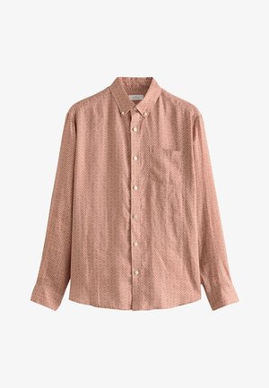 Világos korallszínű, gyémántmintás gombos ing. Hosszú ujjú, hegyes gallérral és egy mellzsebbel. Pamut anyagból készült.