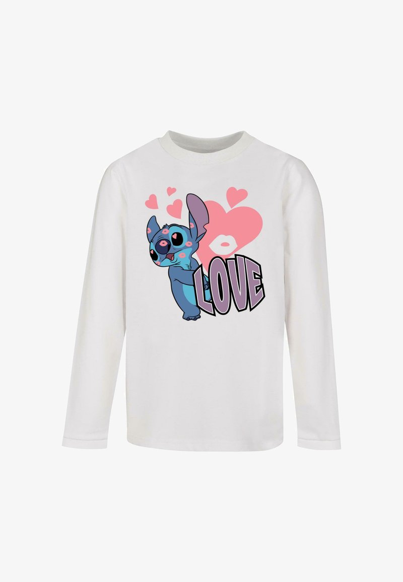 T-shirt bianco a maniche lunghe con un personaggio cartone animato blu, con grandi orecchie e una grafica a forma di cuore, accompagnato dalla parola "AMORE" in lettere grasse.