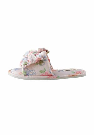 Slide-on slipper with pink floral fabric, padded sole, and large fabric bow detail on top, designed for indoor use.