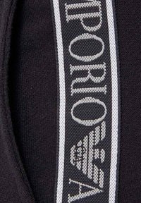 GA EAGLE - Pantalon de survêtement - black