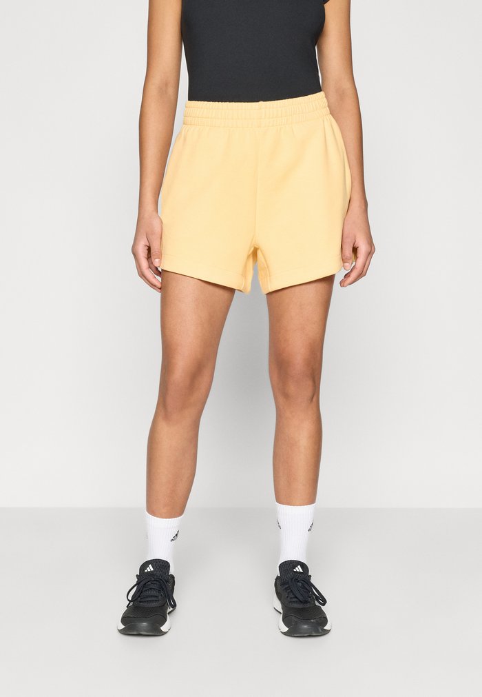 adidas SOFT LUX LOOSE - Pantalón corto de deporte - semi ice tangerine