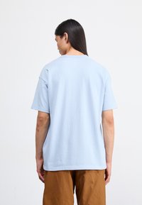 Nike Sportswear TEE - T-shirts - light armoury blue