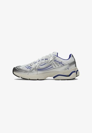 Silver and white athletic shoe with mesh and leather materials, featuring blue accents, a textured surface, and a thick white sole.
