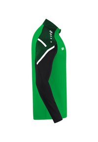Maglietta sportiva a maniche lunghe verde e nera con colletto alto, caratterizzata da motivi geometrici sulle spalle e dettagli bianchi.