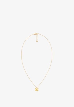 Cadena delicada de oro con un pequeño colgante de trébol de cuatro hojas y cierre ajustable sobre fondo blanco.