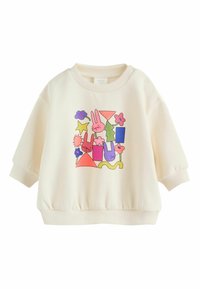 Sudadera color crema hecha de tela suave, con un estampado colorido de formas geométricas y conejos de dibujos animados. Puños y dobladillo acanalados.