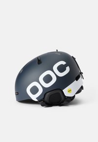 Casque avec un extérieur mat bleu marine, grand logo "poc" blanc, sangles ajustables, ouvertures de ventilation et étiquette de technologie MIPS en jaune.