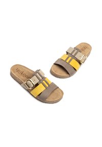 Gray and yellow suede slip-on sandals with a wide strap design, featuring a gold buckle accent and textured cork sole.