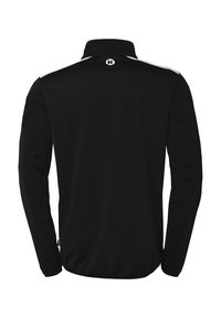 Zwarte polo met lange mouwen en een opstaande kraag, voorzien van witte schouderaccenten en een logo op de rug. Glad, zacht textuur van de stof.