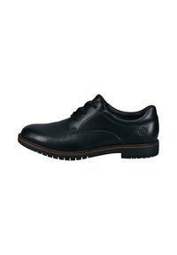 Schwarze Lederanzugschuhe mit glatter Oberfläche, runder Zehenform und dezentem Steppdetail. Mit niedrigem Absatz und rutschfester Gummisohle.