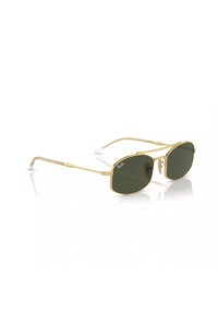 Occhiali da sole con montatura dorata e lenti verde scuro. Bracci in metallo sottili con punte trasparenti. Forma delle lenti angolare con logo del marchio sul frontale.