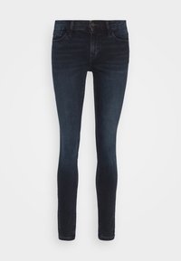 Jeans skinny de mezclilla de lavado oscuro con un diseño clásico de cinco bolsillos, cierre frontal con botón y un ligero desgaste para mayor textura.