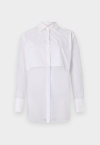 White long-sleeve blouse made of lightweight fabric, featuring a classic collar, front buttons, and a layered design with a sheer lower section.