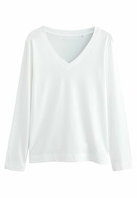 Vit långärmad T-shirt med V-hals, gjord av mjuk bomull. Har en avslappnad passform med minimala sömdetaljer.