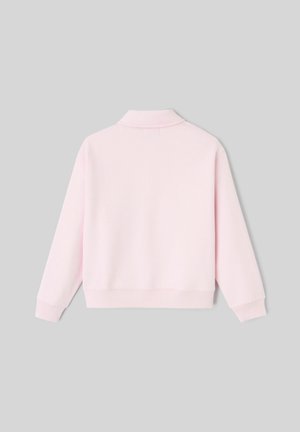 Sweatshirt rose clair avec un col, des manches longues et des poignets côtelés. Le tissu semble doux et lisse, avec un design minimaliste.
